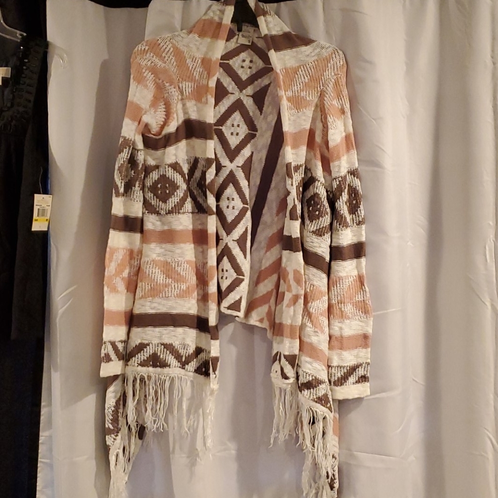 Super comfy boho cardigan with fringe bottom.